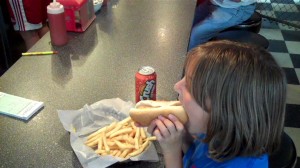 Little Miss Chows Down at Naughty Dawgs